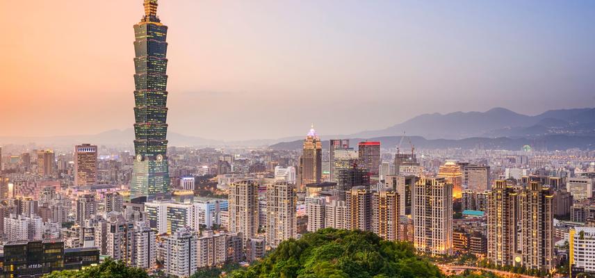 A view of the Taiwan cityscape against a pastel-coloured sunset